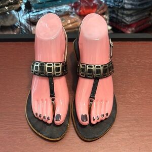 Onex Black Sandals with T-Strap and Gold Accents